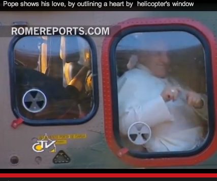 Pope trace heart on helicopter window