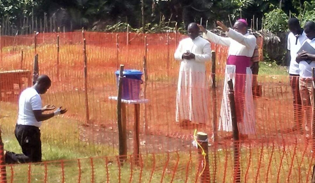 Image of African Bishop Blessing a Vincentian Father with Ebola Impacts Social Networks