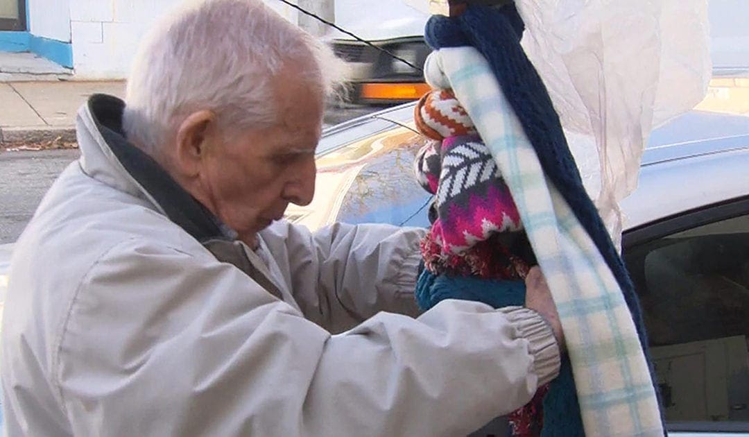 84-year-old Man Giving Out Scarves to Those in Need, in Memory of Late Son